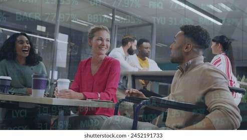 Image of financial data processing over diverse business people at office. Global finances, business and digital interface concept digitally generated image.