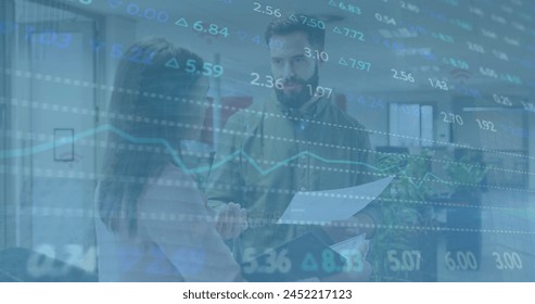 Image of financial data processing over business people in office. Global business, finance, computing, connections and data processing concept digitally generated image.