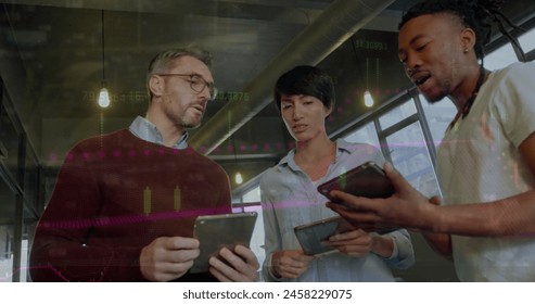 Image of financial data processing over diverse business people using electronic devices. Global business, finance, computing and data processing concept digitally generated image.