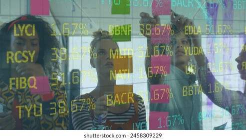 Image of financial data processing over diverse business people in office. Global business, finance, computing and data processing concept digitally generated image.