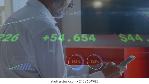 Image of financial data processing over caucasian businessman using smartphone. Global business, networks, connections, computing and data processing concept digitally generated image.