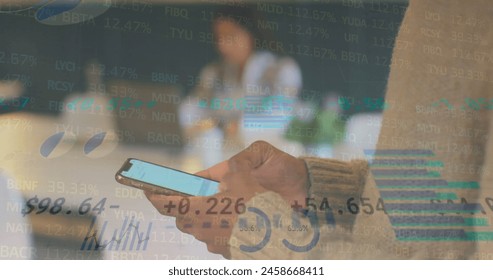Image of financial data processing over biracial businessman using smartphone. Global business, networks, connections, computing and data processing concept digitally generated image.