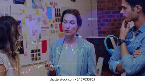 Image of financial data processing over diverse male and female colleagues discussing at office. Global finance and business data technology concept