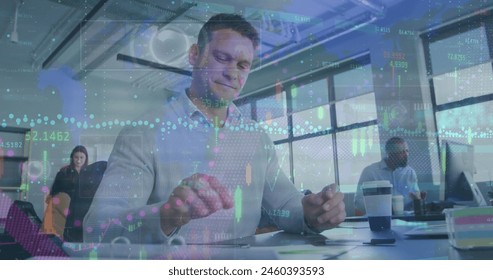 Image of financial data processing over caucasian man using smartphone at office. Global finance and business technology concept