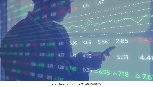 Image of financial data processing over businessman using smartphone. Global business, finance, computing and data processing concept digitally generated image.