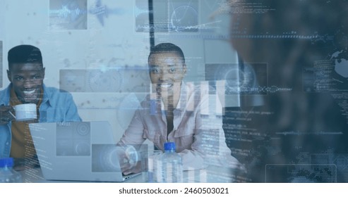 Image of financial data processing over diverse business people. Global business, finances, computing and data processing concept digitally generated image.