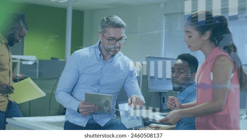 Image of financial data processing over diverse business people. Global business, finances, computing and data processing concept digitally generated image.