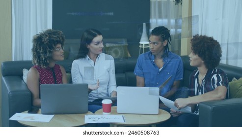 Image of financial data processing over diverse business people. Global business, finances, computing and data processing concept digitally generated image.