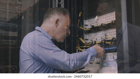 Image of financial data processing over caucasian server room worker. global business, finance and connections concept digitally generated image.
