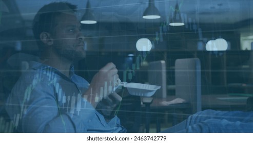 Image of financial data processing over caucasian businessman eating in office. Global business, finance, computing and data processing concept digitally generated image. - Powered by Shutterstock