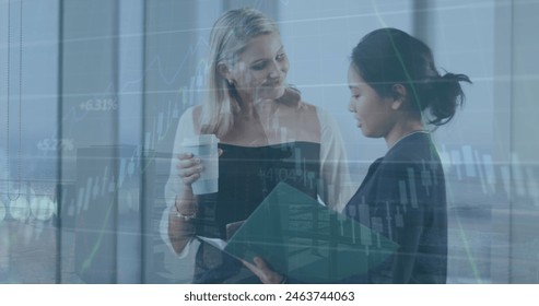 Image of financial data processing over diverse businesswomen. Global business, finance, computing and data processing concept digitally generated image. - Powered by Shutterstock