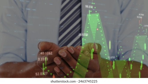 Image of financial data processing over biracial businessman. Global business, finance, computing and data processing concept digitally generated image.