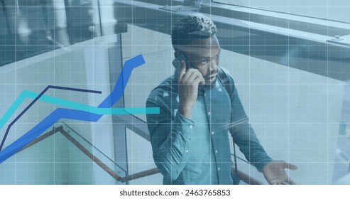 Image of financial data processing over african american businessman using smartphone. Global business, finances and digital interface concept digitally generated image. - Powered by Shutterstock - Get 15% off with code: PIKWIZARD15