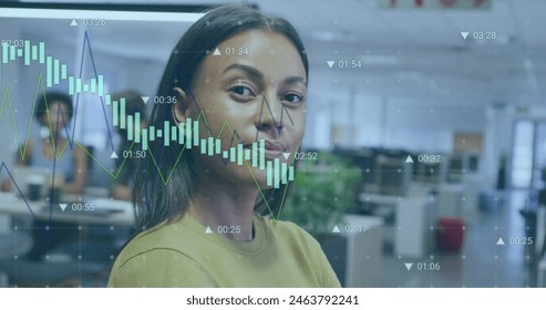 Image of financial data processing over biracial businesswoman. Global business, finances, computing and data processing concept digitally generated image.