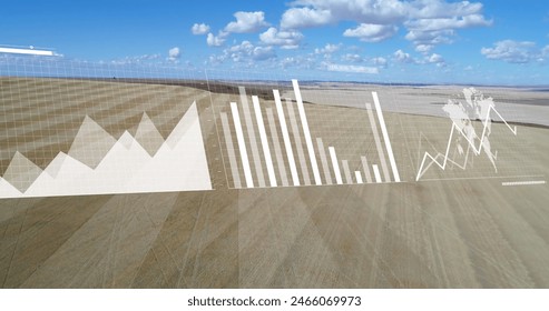 Image of financial data processing over landscape. Global business, finances and digital interface concept digitally generated image.