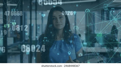 Image of financial data processing over biracial businesswoman. Global networks, business, finance, computing and data processing concept digitally generated image.