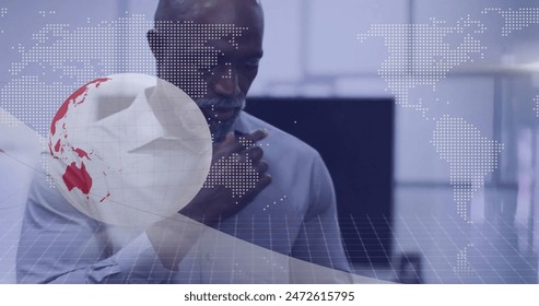 Image of financial data processing over african american businessman in office. Global finance, business, connections, computing and data processing concept digitally generated image.