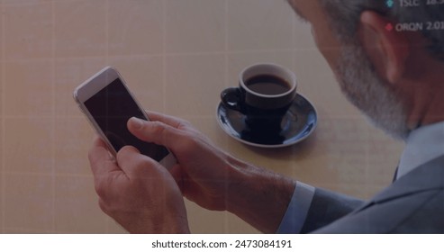 Image of financial data processing over caucasian man using smartphone. Global finances, business and digital interface concept digitally generated image.