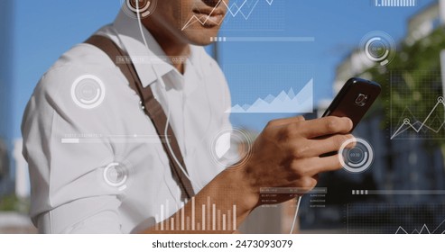 Image of financial data processing over biracial businessman using smartphone. Global business, communication, computing and data processing concept digitally generated image.