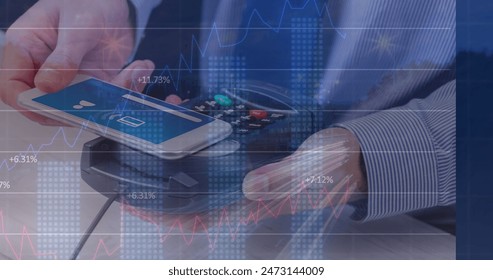 Image of financial data processing over man with smartphone and payment terminal. Global business, finance, online payment and data processing concept digitally generated image.
