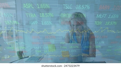 Image of financial data processing over businesswoman. Global business, finance, computing and data processing concept digitally generated image.