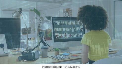 Image of financial data processing over biracial businesswoman working in office. Global business, finance, computing and data processing concept digitally generated image. - Powered by Shutterstock - Get 15% off with code: PIKWIZARD15