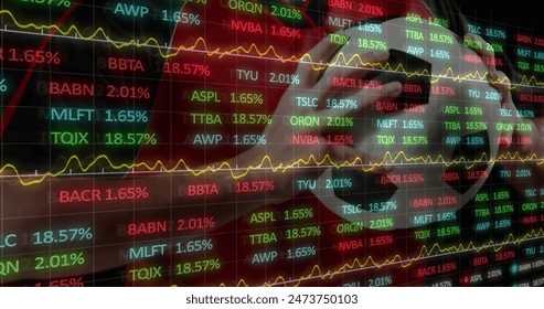 Image of financial data processing over male football player holding football in the background. Global finance business interface concept digitally generated image.