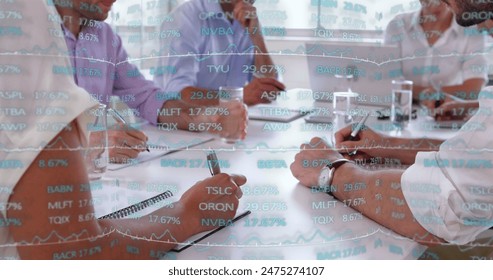 Image of financial data processing over diverse business people in office. Global business, finances, computing and data processing concept digitally generated image.