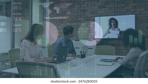 Image of financial data processing over diverse business people in office. Global computing, digital interface and data processing concept digitally generated image.