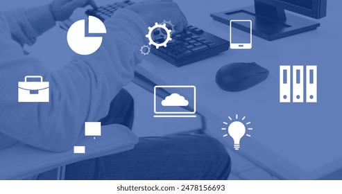 Image of financial data processing over man using computer in office. Global business, finance, cloud computing and data processing concept digitally generated image.