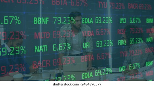 Image of financial data processing over diverse business people. Global business, finances, computing and data processing concept digitally generated image.