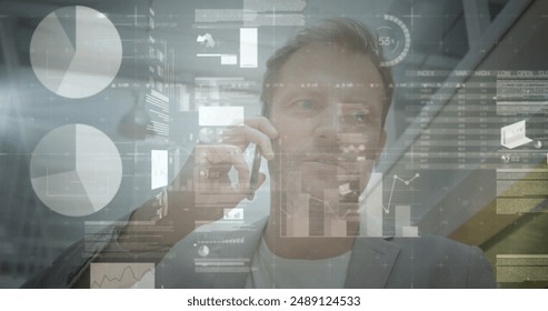 Image of financial data processing over man using smartphone. Global business, finances, computing and data processing concept digitally generated image.