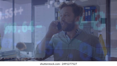 Image of financial data processing over man using smartphone. Global business, finances, computing and data processing concept digitally generated image.