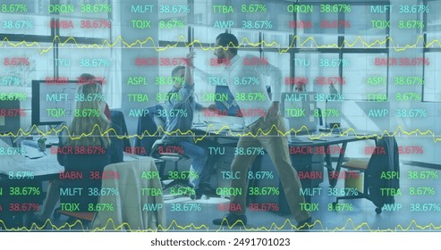 Image of financial data processing over diverse business people in office. Global business, finances, computing and data processing concept digitally generated image.