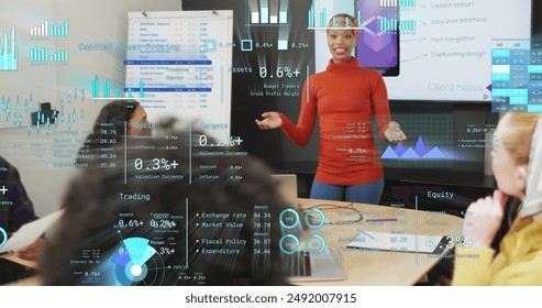 Image of financial data processing over diverse business people in office. Global finance, business, connections, computing and data processing concept digitally generated image.