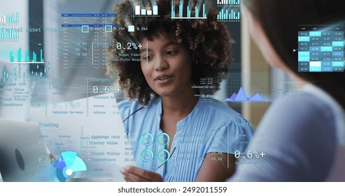 Image of financial data processing over diverse business people in office. Global finance, business, connections, computing and data processing concept digitally generated image.