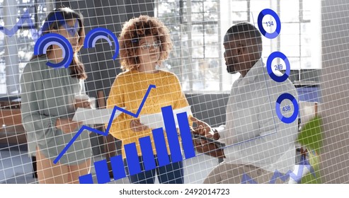 Image of financial data processing over diverse business people in office. Global finance, business, connections, computing and data processing concept digitally generated image.