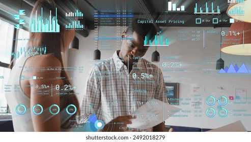 Image of financial data processing over diverse business people in office. Global finance, business, connections, computing and data processing concept digitally generated image.