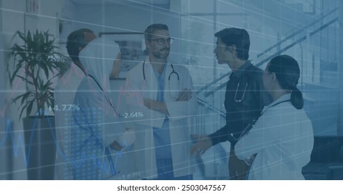 Image of financial data processing over diverse doctors in hospital. Global medicine, healthcare, connections, computing and data processing concept digitally generated image.