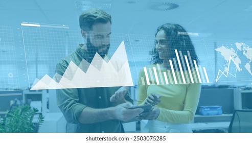 Image of financial data processing over diverse colleagues discussing work in office. Global business, finances, computing and digital interface concept digitally generated image.