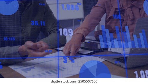 Image of financial data processing over diverse business people in office. Global finance, business, connections, computing and data processing concept digitally generated image.