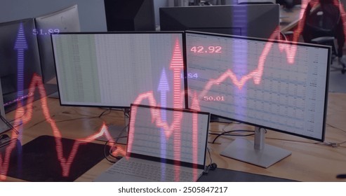 Image of financial data processing over computers on office desk. Global finance, business, connections, computing and data processing concept digitally generated image.