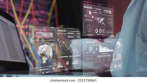 Image of financial data processing over african american scientist in server room. Global business, communication and digital interface concept digitally generated image. - Powered by Shutterstock