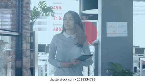 Image of financial data processing over biracial businesswoman in office. Global finance, business, connections, computing and data processing concept digitally generated image.