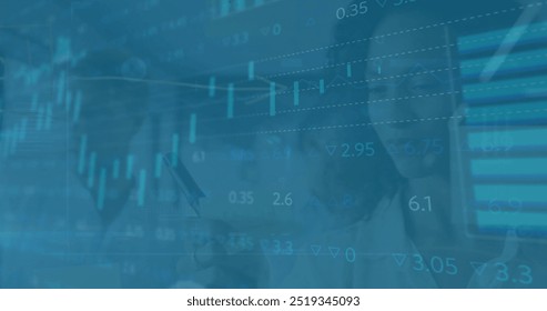 Image of financial data processing over diverse business people in office. Global finance, business, connections, computing and data processing concept digitally generated image. - Powered by Shutterstock