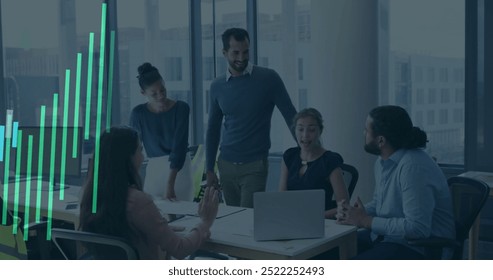 Image of financial data processing over diverse business people in office. Global finance, business, connections, computing and data processing concept digitally generated image.