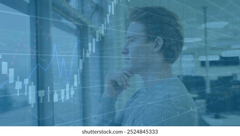 Image of financial data processing over caucasian businessman in office. Global finance, business, connections, computing and data processing concept digitally generated image.