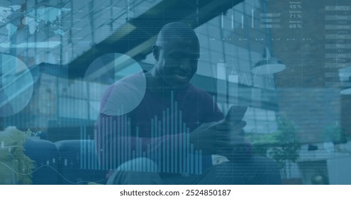 Image of financial data processing over african american businessman using smartphone. Global finance, business, connections, computing and data processing concept digitally generated image.