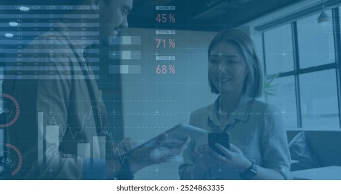Image of financial data processing over diverse business people in office. Global finance, business, connections, computing and data processing concept digitally generated image.