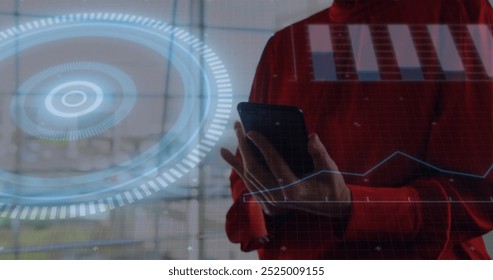 Image of financial data processing over biracial woman using smartphone. Global finance, business, connections, computing and data processing concept digitally generated image.